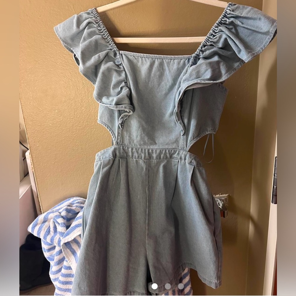 Denim romper from Maple clothing never been worn.  Original 110$